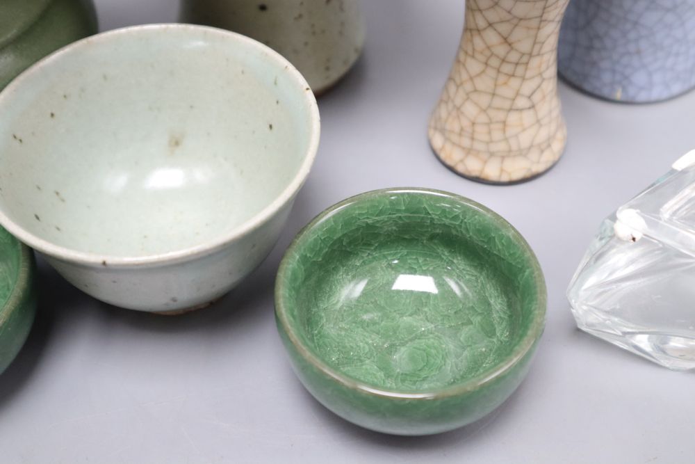 Five Oriental celadon type bowls or vases and two crackleware vases and five glass condiments, tallest 26cm